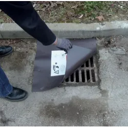 Obturateur magnétique pour plaque métallique d'égout
